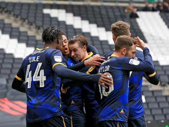 Rovers celebrate Jacob Ramsey's goal at MK Dons
