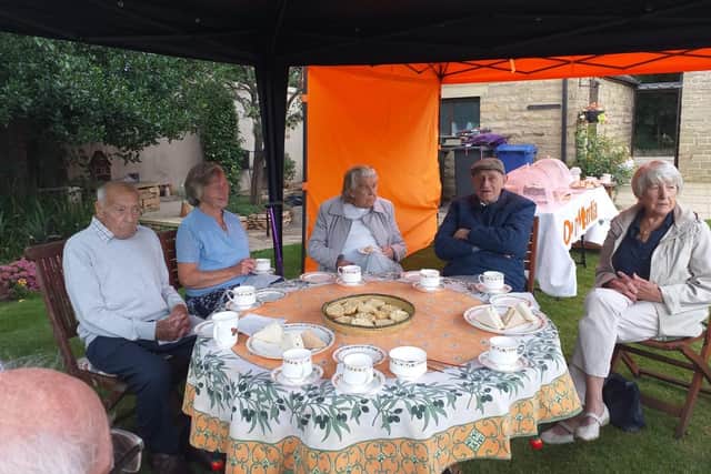 The first tea party was held on July 21 hosted by Eileen Harrington.
