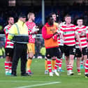 Grant McCann has put together a strong squad at Rovers as they attempt to win promotion out of League Two.