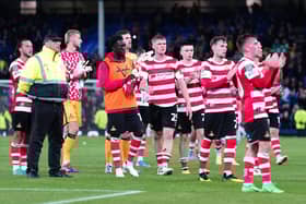 Grant McCann has put together a strong squad at Rovers as they attempt to win promotion out of League Two.