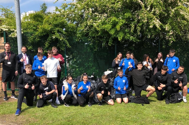 Youngsters and staff at Astrea Academy, Woodlands, who took part in the litter operation in Balby
