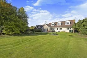 The village home, viewed from its south-facing gardens.