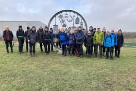 group photo at the sculpture commemorating the coal mining past