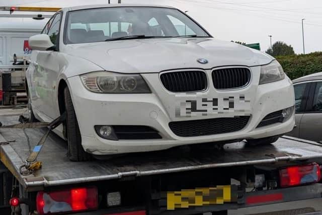 This car was being driven dangerously on false plates.