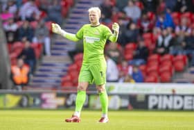 Doncaster Rovers goalkeeper Jonathan Mitchell is one of four players leaving the club.