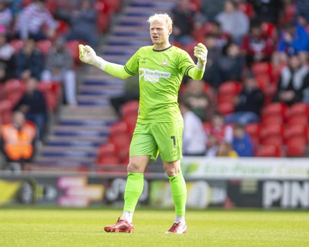 Doncaster Rovers goalkeeper Jonathan Mitchell is one of four players leaving the club.