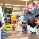 This summer, Morrisons is enhancing family visits with Kids Activity Stations in collaboration with the National Literacy Trust, offering games and puzzles in all stores to boost children's literacy. All 397 Morrisons cafés will feature these stations and a kids' book swap scheme, with free colouring crayons available. Additionally, Morrisons has child-friendly checkouts and child-sized trolleys to make shopping fun and engaging for kids.