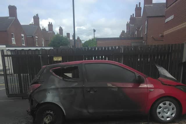 One of two cars torched at Concorde Mews.