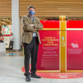 Tchad Western from Sheffield Children's Hospital with the charity box in Meadowhall Shopping Centre.