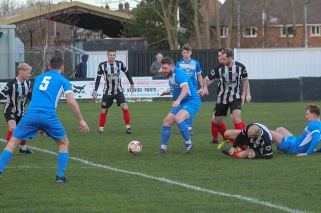 Action from Armthorpe Welfare's defeat at Brigg Town. Photo: Steve Pennock