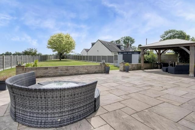 The rear garden has a patio that's ideal for entertaining.