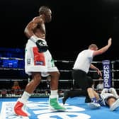 Zolani Tete as Referee Howard Foster halts the fight after Jason Cunningham is knocked out during the IBF International and Commonwealth Super Bantamweight Title fight between Jason Cunningham and Zolani Tete at OVO Arena Wembley on July 02, 2022 in London, England. (Photo by James Chance/Getty Images)