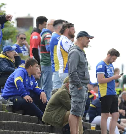 Dons fans. Photo: Rob Terrace