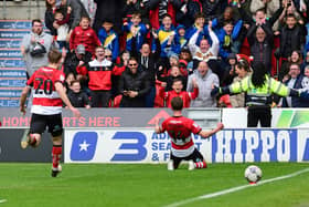 Doncaster's Harrison Biggins celebrates his goal to make it 3-2 against Barrow. (Picture:Andrew Roe/AHPIX LTD)