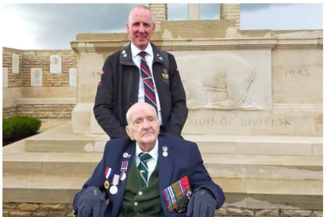 Fred and his grandson Phillip Knight in Normandy.