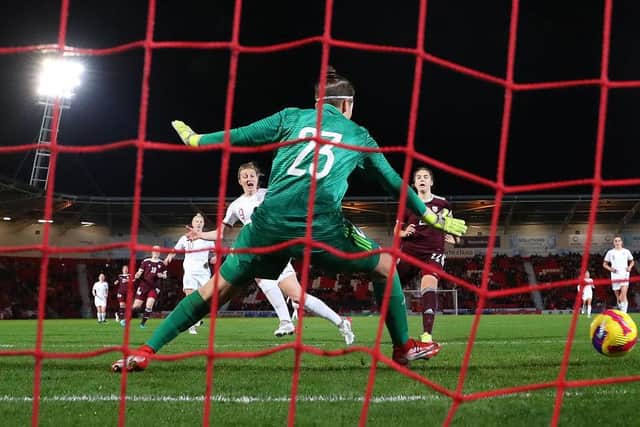 Ellen White scores to become the Lionesses' record goalscorer. Photo by Catherine Ivill/Getty Images