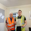 Logan Coulthread (R) with Brain Green, work coach at Aspire to Be