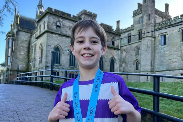 Tiberius Batchelor, who has Crohn's, completed the charity run at Alton Towers.