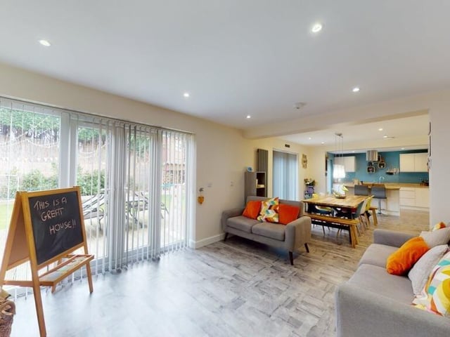 View of the spacious family area through to dining room and kitchen.