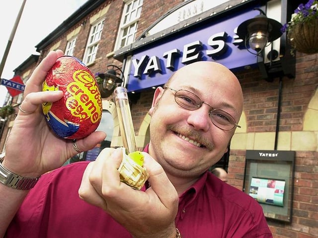 Doncaster Yates' head of promotions, Saul, shows off their special Easter cocktail - a Cadbury's Creme egg and Tequila slammer, April 2001