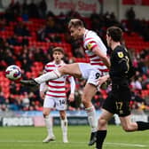 Doncaster Roves striker George Miller has a shot at goal against Hartlepool United.