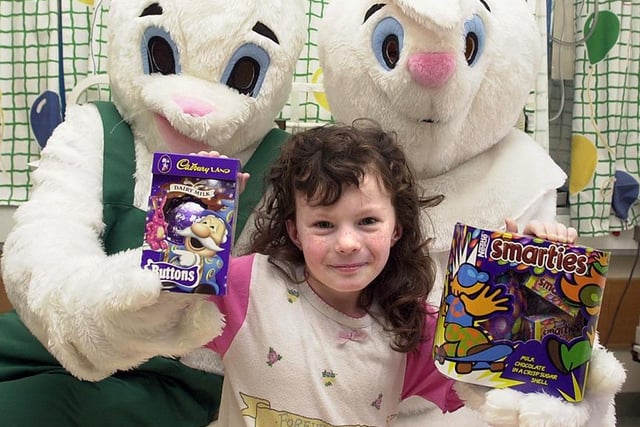 Doncaster's two Asda stores donated a large number of Easter eggs to Doncaster Royal Infirmary's Children's Hospital. Our picture shows patient Kelly Lockett, aged six, of Intake, with two of the chocolate eggs, April 2001