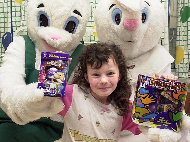 Doncaster's two Asda stores donated a large number of Easter eggs to Doncaster Royal Infirmary's Children's Hospital. Our picture shows patient Kelly Lockett, aged six, of Intake, with two of the chocolate eggs, April 2001