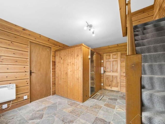 A pine sauna and shower is part of a two-storey arrangement with versatile studio above.