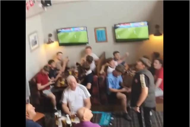 Police and council officials closed the pub after footage emerged of customers ignoring social distancing, not wearing masks and one member of staff offering a man a fight and calling him a 'f***ing moron.'