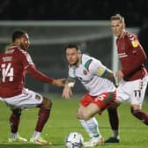 Lee Tomlin in action for Walsall last season (photo by Pete Norton/Getty Images).