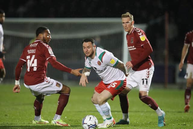 Lee Tomlin in action for Walsall last season (photo by Pete Norton/Getty Images).