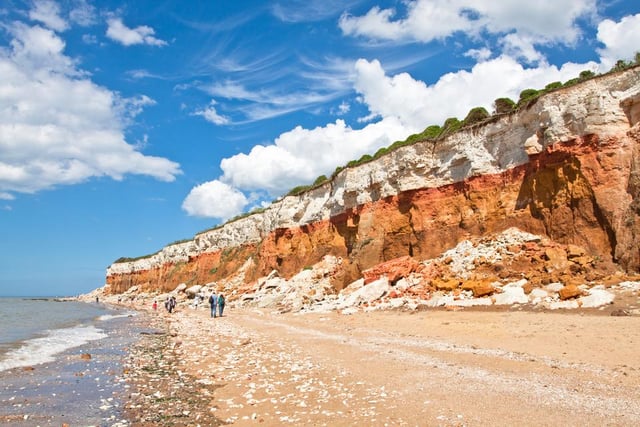 Known for its striking red and white striped cliffs, Hunstanton Beach runs for two miles and has an abundance of rock pools where visitors can hunt for fossils among the rocks and shingle.