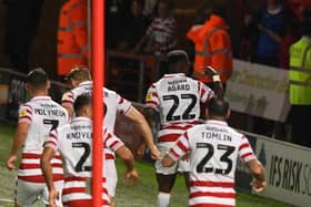 Doncaster's Keiran Agard celebrates his winner.