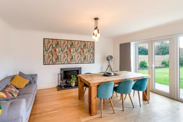 The dining area, with access to an outdoor patio and the garden.