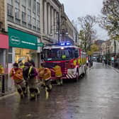 Fire crews haul the engine through the centre of Doncaster.
