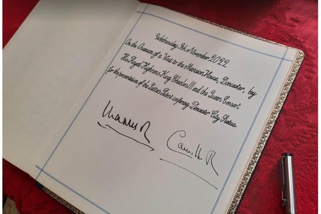 The Royal couple signed the visitor's book.