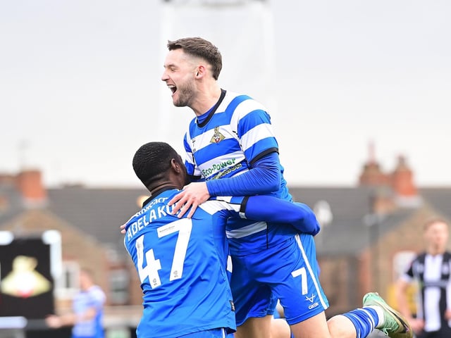Luke Molyneux celebrates Rovers' opener with Hakeeb Adelakun.