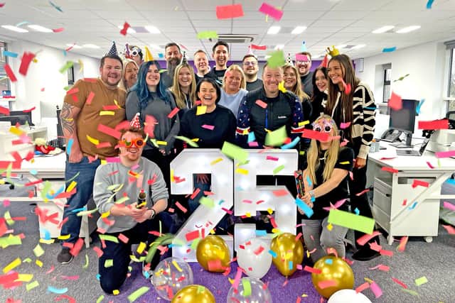 The team at Bubble Design celebrating its 25th anniversary