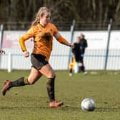 Belles in action against Wolves.