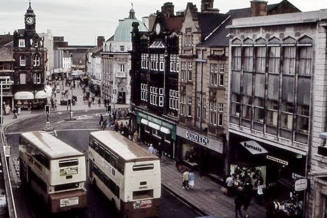 Buses outside the Arndale Centre in the 1980s. 