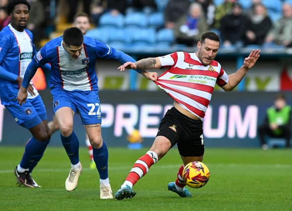 Picture Howard Roe/AHPIX LTD; Football, SkyBet; League Two;
Carlisle United v Doncaster Rovers;
23/11/2024 3.00pm
Doncasters' Billy Sharp is held back, but no penalty