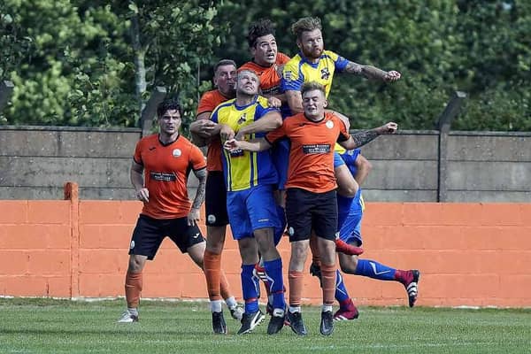 Action from Harworth Colliery's win over Dearne & District. Photo: John Mushet