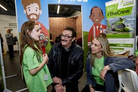 Chloe with a TCAA volunteer and TV star Paul Chuckle
