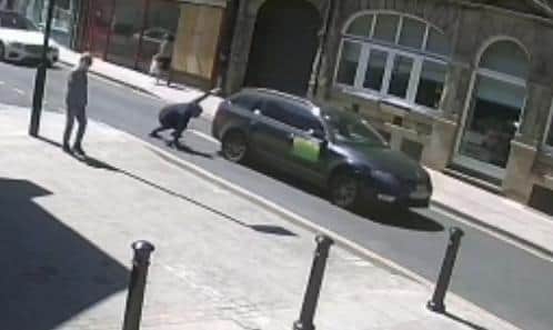 The video shows the man being run over and having to jump out of the way.