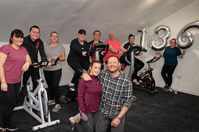 Hayley Steadman and her partner Russell Alderson, pictured with Stef Grove, Aimee Spaven, Janine Stillie, Sharon Spaven, Claire Williams, Deborah Stocks, Connie Harrison-Haley and Diane Wheatley, during the sponsored cycle event at Woodfield Squash and Leisure Club. Picture: NDFP-01-02-20-SponsoredCycle 2-NMSY