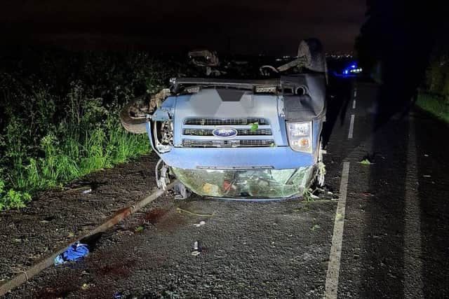 The van ended up facing the wrong way, upside down