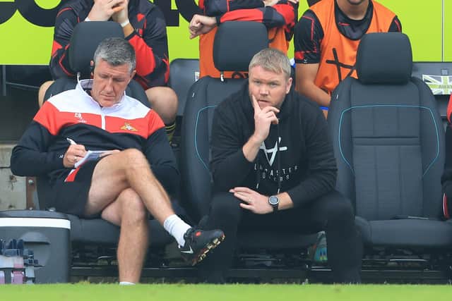 Doncaster Rovers manager Grant McCann (right) and his assistant Cliff Byrne.