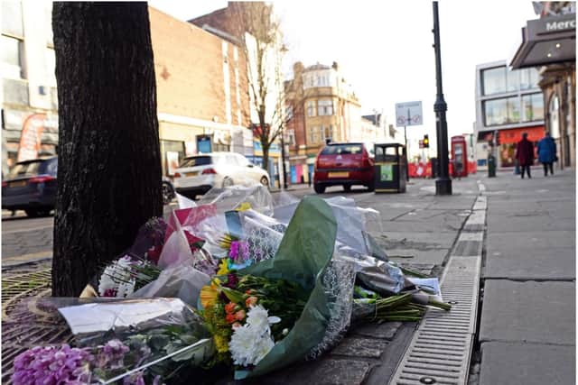 Floral tributes at the scene of the double murders in Doncaster town centre.