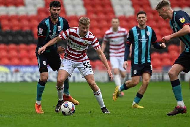 Jack Goodman in first team action for Doncaster Rovers. Photo: Howard Roe/AHPIX