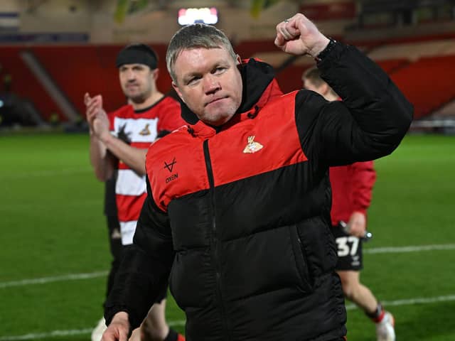 Grant McCann led Rovers on an unbeaten April as they clinched a play-off spot.